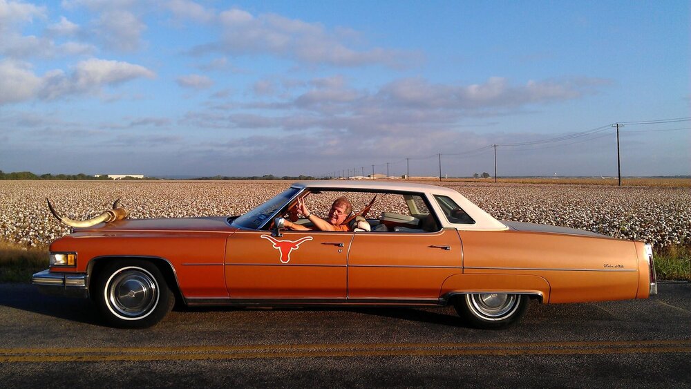 Scott Wilson UT football fan in his Cadillac.jpg